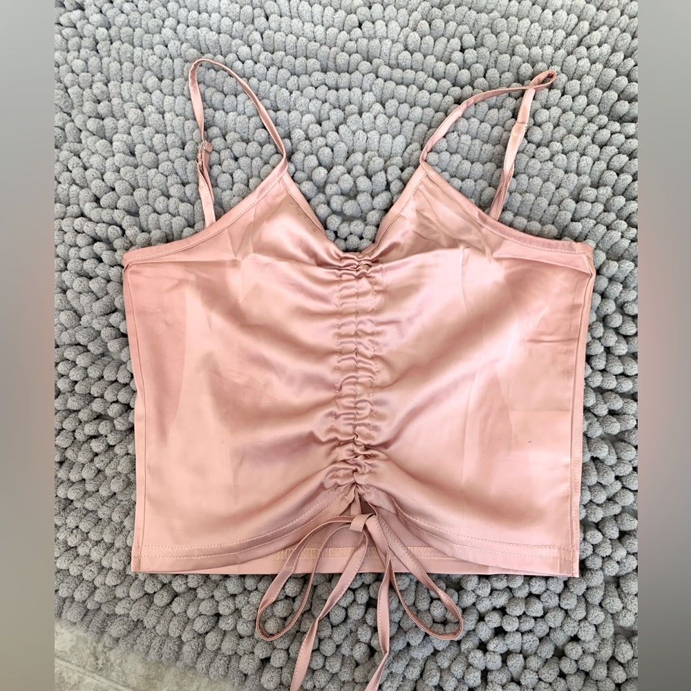 Light pink satin cinch front spaghetti strap crop top